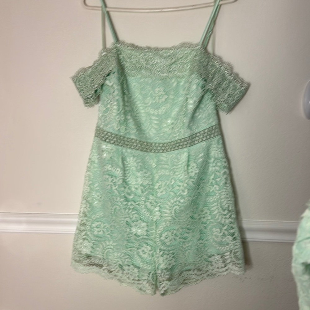 Francesco Collection. Romper Off Shoulder. Mint Green Lace  NWT